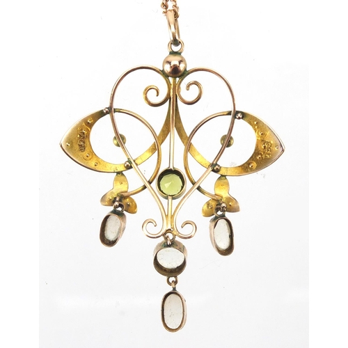 802 - Art Noveau 9ct gold moonstone, seed pearl and Peridot pendant on a 9ct gold necklace, the pendant 5.... 