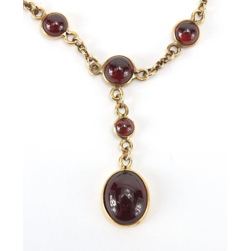 868 - 9ct gold garnet necklace and bracelet, the necklace 44cm in length, approximate weight 12.5g