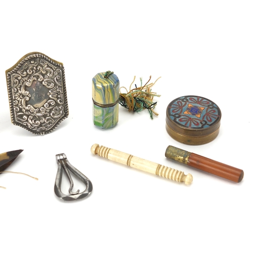18 - Miscellaneous sewing objects including marbleised cotton reel holder, silver fronted ivory aide memo... 