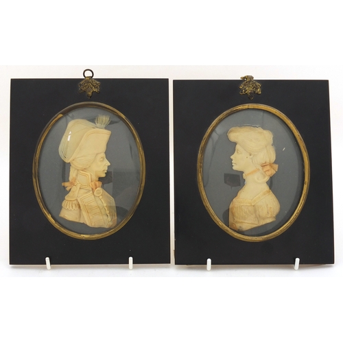 33 - Pair of 19th century wax portraits, Lord Nelson and Lady Hamilton by Leslie Ray of London, both hous... 