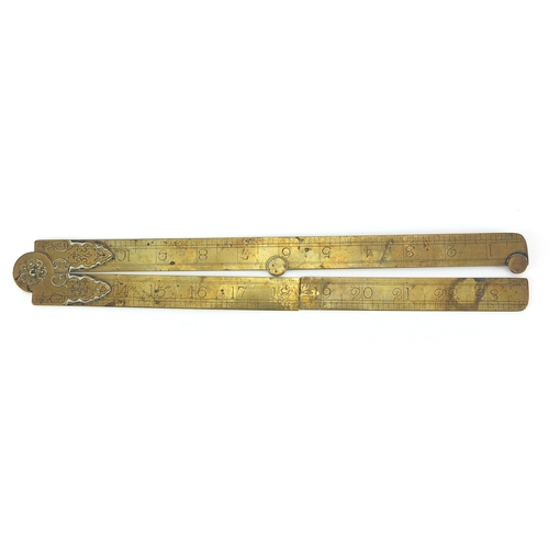 121 - 19th century brass rule together with two brass and boxwood rulers including a sliding example by F ... 