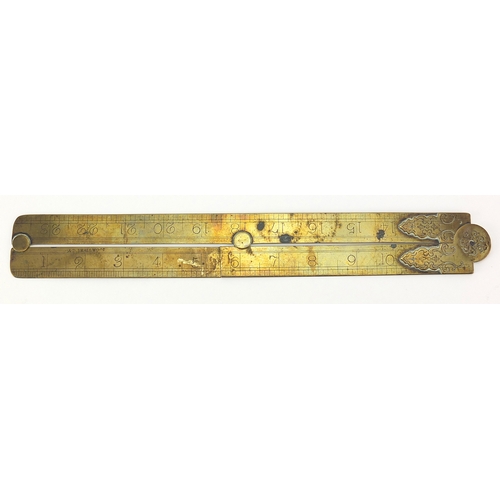 121 - 19th century brass rule together with two brass and boxwood rulers including a sliding example by F ... 