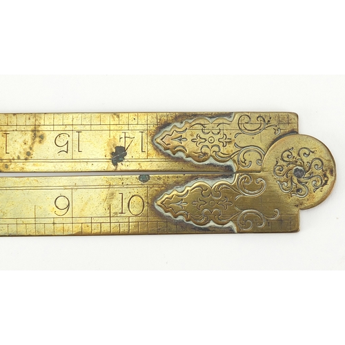 121 - 19th century brass rule together with two brass and boxwood rulers including a sliding example by F ... 