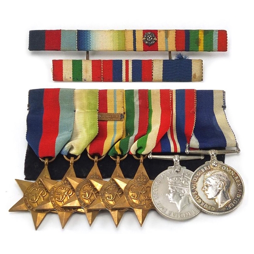 302 - British Military World War II medal group including Naval long service and good conduct medal awarde... 