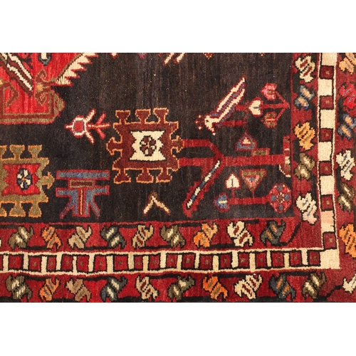 2039 - Rectangular Persian tribal carpet runner, having an all over geometric design onto a red ground, 291... 