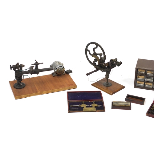 126 - Two vintage watch makers lathes together with watch makers precision tools and accessories, the larg... 