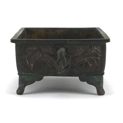 477 - Chinese rectangular bronze planter with twin handles, cast with panels of goldfish, 8cm H x 21.5cm W... 