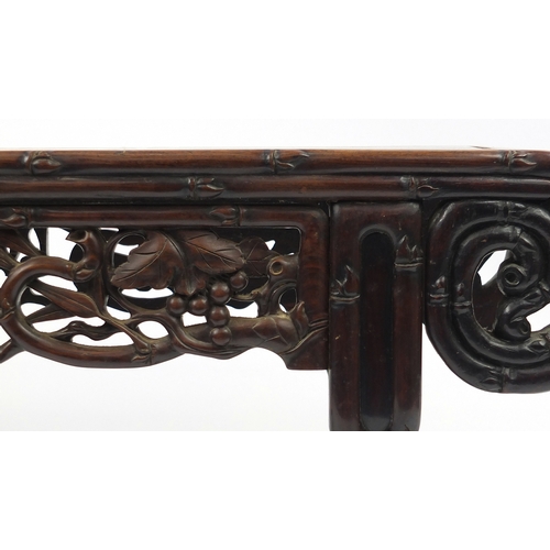 463 - Chinese rosewood hall bench, carved with foliage and berries, 53cm H x 105cm W x 34.5cm D