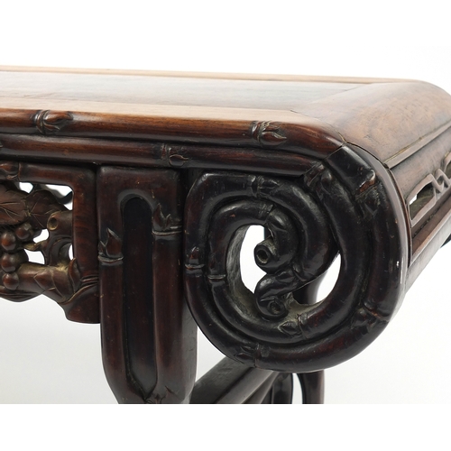 463 - Chinese rosewood hall bench, carved with foliage and berries, 53cm H x 105cm W x 34.5cm D