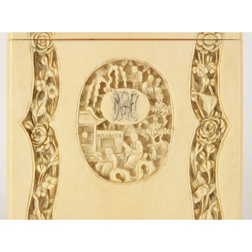 513 - Chinese Canton ivory card case carved with panels of flowers and figures, 11.5cm H x 7.5cm W x 1cm D