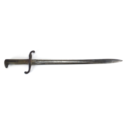 338 - 19th century German 1871 bayonet by Coulaux & Co with scabbard, various impressed marks, 63cm in len... 