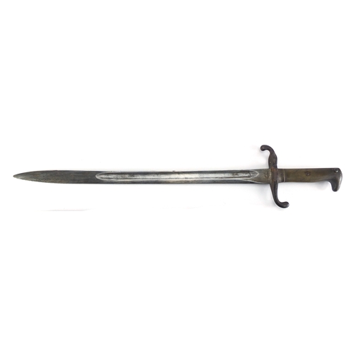 338 - 19th century German 1871 bayonet by Coulaux & Co with scabbard, various impressed marks, 63cm in len... 