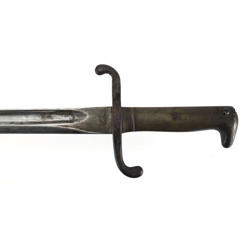 338 - 19th century German 1871 bayonet by Coulaux & Co with scabbard, various impressed marks, 63cm in len... 