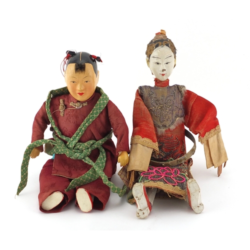 519 - Two Chinese bowls including a hand painted paper mache boy in traditional dress, the largest 25cm in... 