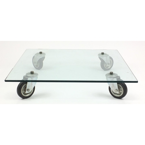 30 - Heavy industrial style glass coffee table on wheels, 20cm H x 100cm W x 100cm D