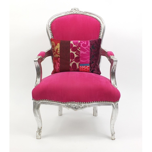 18 - French style open arm chair with silvered frame and pink upholstery, 93cm high