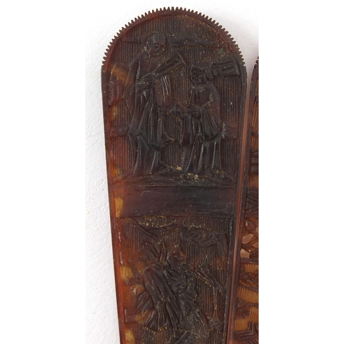 518 - Chinese canton Tortoiseshell fan, finely carved with figures amongst pagodas and dragons, 19cm in le... 