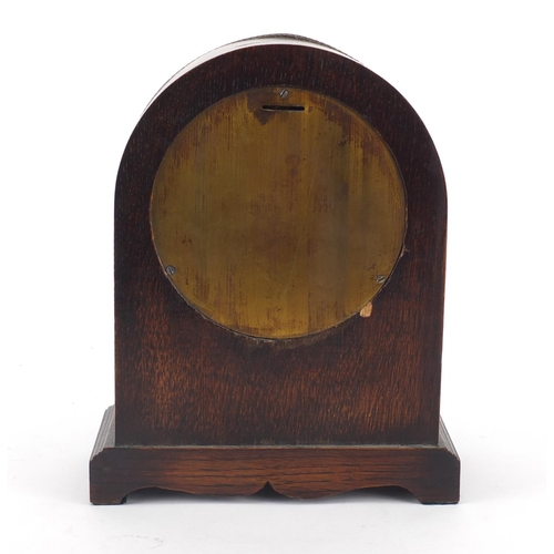 110 - Oak cased mantel clock, the silvered dial marked GEO. Tarrat Leicester, 22cm high