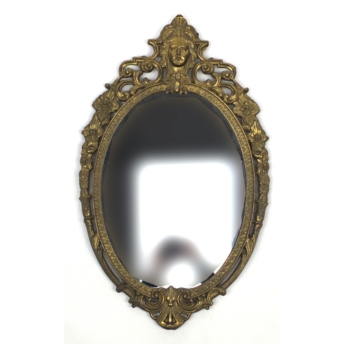 41 - Oval brass framed mirror, 66cm x 40cm