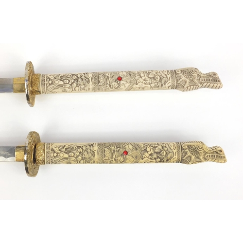 137 - Two decorative Japanese Samurai swords, the largest 105cm in length