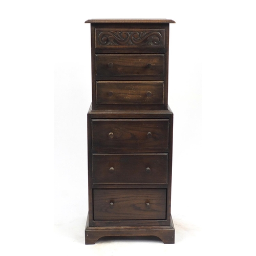 26 - Carved oak chest on chest fitted with six drawers, 120cm H x 45cm W x 35cm D