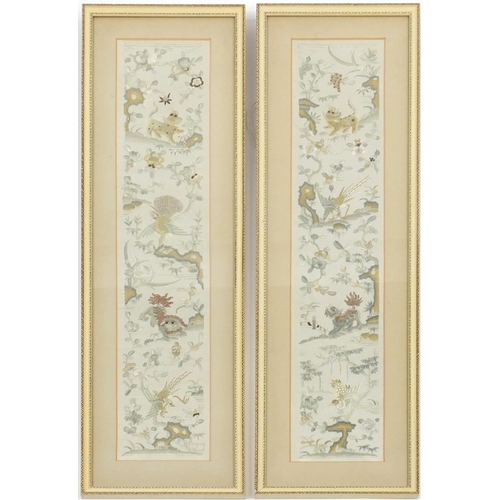 192 - Pair of Chinese silk embroideries of animals amongst flowers, each mounted and framed