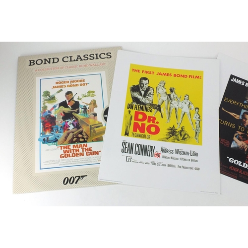 607 - James Bond, a collection of classic wall art and book of Bond Girls