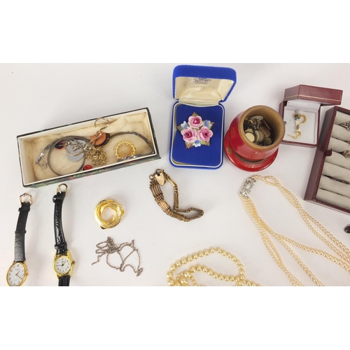 292 - Costume jewellery including brooches, rings, wristwatches and necklaces