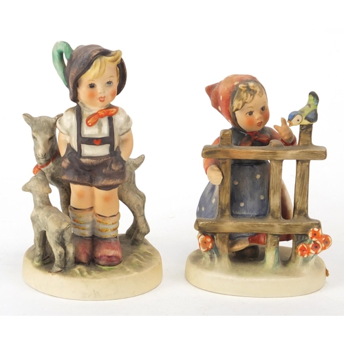 398 - Four hand painted Goebel Hummel figures, the largest 11.5cm high