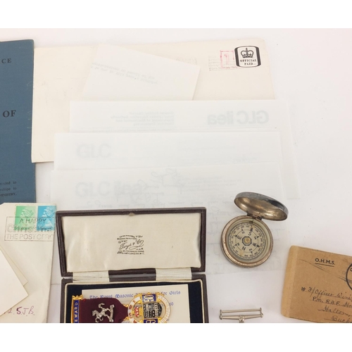 696 - British Military interest World War II medals with paperwork, a compass and two Masonic medals