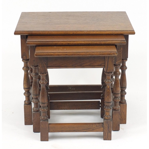 49 - Occasional furniture comprising nest of three oak tables, mahogany magazine rack with tooled leather... 