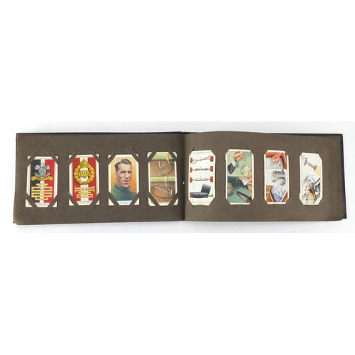 619 - Selection of World stamps arranged in albums and cigarette cards including motor cars and aviation