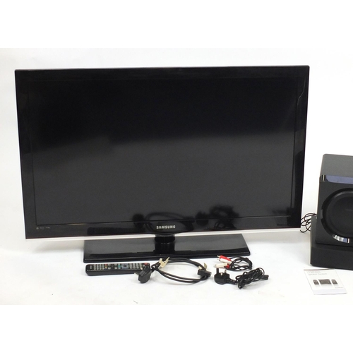 11 - Samsung 40inch LCD television with remote, together with Sandstrom 2.1 wireless speaker system and L... 