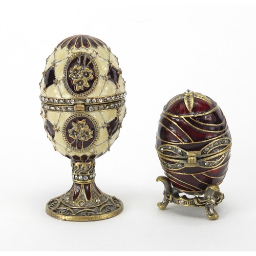 350 - Two enamelled jewelled egg trinkets, the largest 8.5cm high