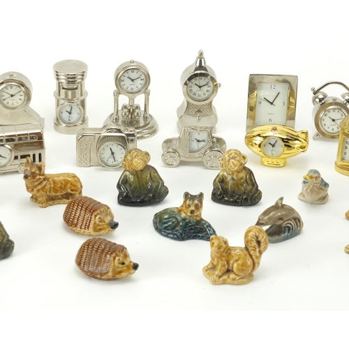 348 - Group of miniature clocks and Wade Whimsies