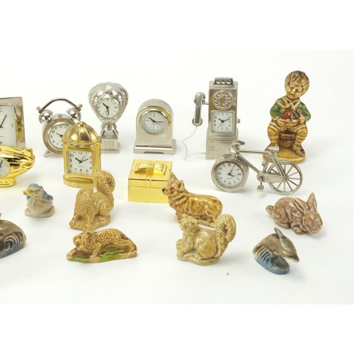 348 - Group of miniature clocks and Wade Whimsies