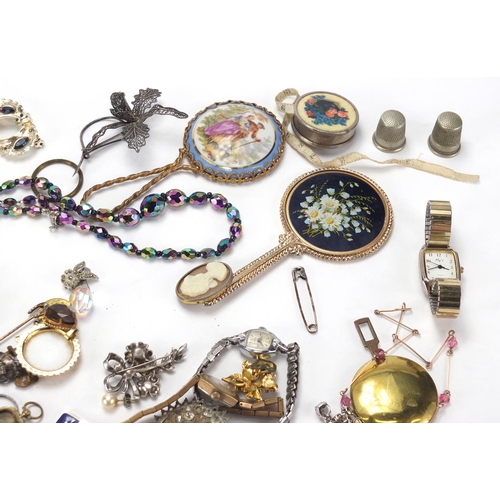 307 - Costume jewellery including a silver Filigree brooch, Limoge style hand mirror and necklaces