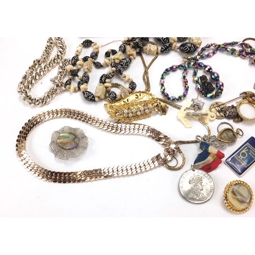 307 - Costume jewellery including a silver Filigree brooch, Limoge style hand mirror and necklaces