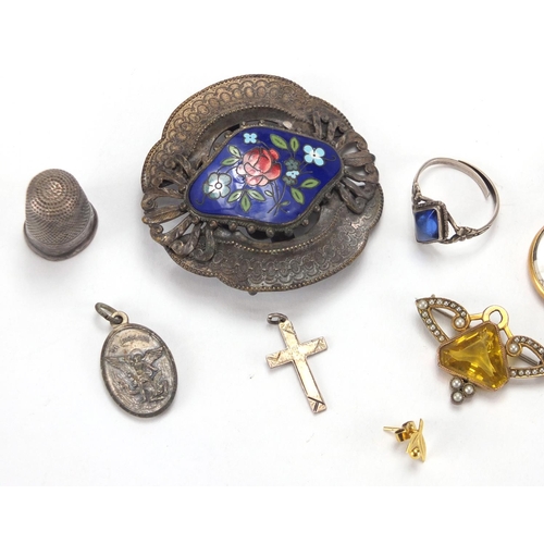 254 - Miscellaneous costume jewellery, some silver including Christening bangle, brooches, pendants and en... 