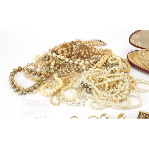 309 - Costume jewellery including simulated pearl necklaces and silver items