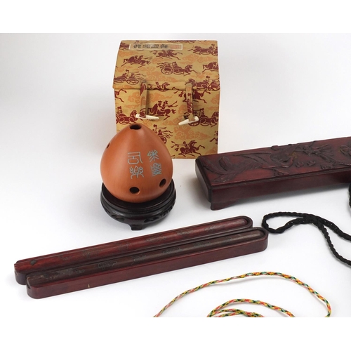 571 - Oriental objects including embroidered bags, chopsticks with metal inlay and a terracotta pot pourri