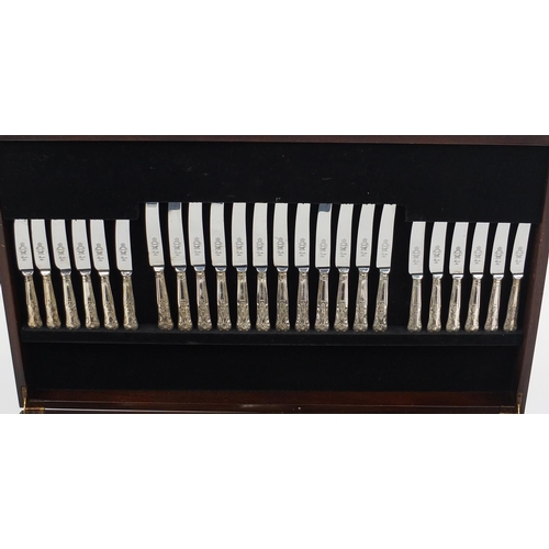 2030 - Arthur Price twelve place canteen of silver plated cutlery, the hinged lid having a tooled leather i... 