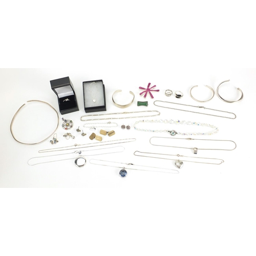 2461 - Mostly silver jewellery including necklaces, pendants, and a 9ct white gold diamond ring