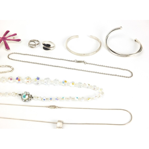 2461 - Mostly silver jewellery including necklaces, pendants, and a 9ct white gold diamond ring