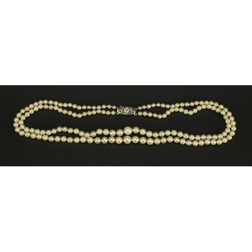 2458 - Two row pearl necklace with 9ct white gold diamond clasp, 40cm in length, approximate weight 25.3g