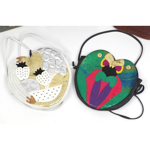 2046 - Five Russell & Bromley handbags including parrot and fruit design examples