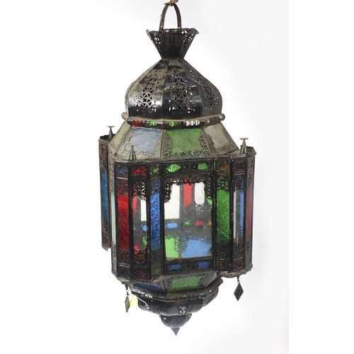 2055 - Pair of Moroccan metal light hangings with coloured glass panels, each 85cm high