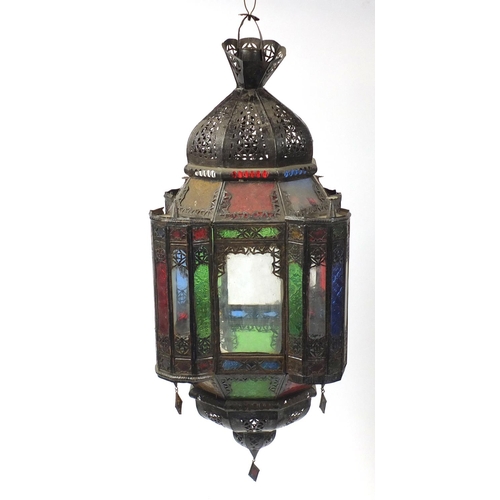 2055 - Pair of Moroccan metal light hangings with coloured glass panels, each 85cm high