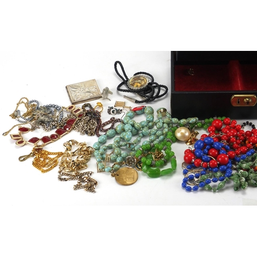 294 - Mostly vintage costume jewellery including earrings, necklaces and bracelets, housed in a jewellery ... 