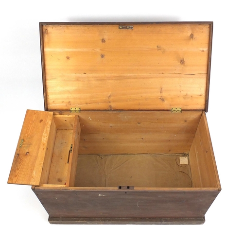22 - Stained pine storage trunk with carrying handles and fitted candle box, 53cm H x 94.5cm W x 50cm D